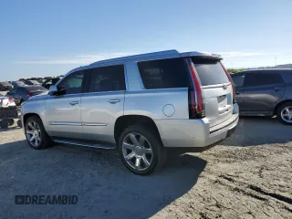 2020 Cadillac Escalade Luxury z VIN 1GYS4BKJ2LR127115, wystawiony jako Copart lot #70709034 z przebiegiem 88 210 mil mil oraz Szkoda całkowita • Salvage title. Historia ofert i sprzedaży dostępna na DreamBid. Obrazek 2.