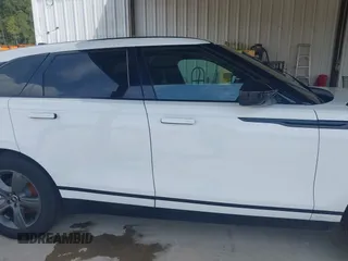 2025 Land Rover Range Rover Velar Dynamic SE with VIN SALYL2EX2SA810750, listed as a IAAI auction lot 42118663 with 4,499 mi miles and . Bid and sale history available at DreamBid. Image 12.