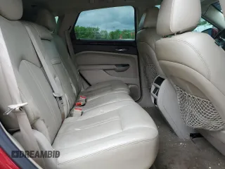 2014 Cadillac SRX Performance Collection z VIN 3GYFNFE38ES560229, wystawiony jako Copart lot #58025485 z przebiegiem 170 344 mil mil oraz Tytuł czysty. Historia ofert i sprzedaży dostępna na DreamBid. Obrazek 11.