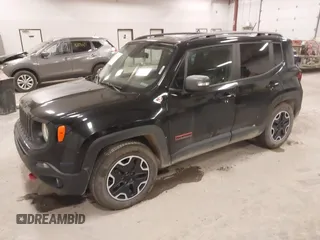 2015 Jeep Renegade Trailhawk with VIN ZACCJBCT7FPB35801, listed as a IAAI auction lot 41991084 with 119,887 mi miles and . Bid and sale history available at DreamBid. Image 2.
