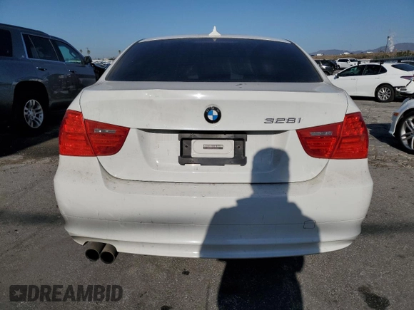 2010 BMW 3 Series 328i with VIN WBAPH5C52AA439642, listed as a Copart auction lot 42956485 with 82,960 mi miles and Salvage title. Bid and sale history available at DreamBid. Image 6.