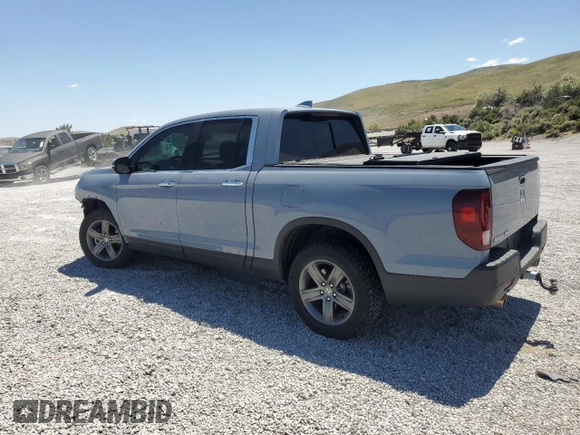 2022 Honda Ridgeline RTL-E with VIN 5FPYK3F79NB024459, listed as a Copart auction lot 59165445 with 21,429 mi miles and Salvage title. Bid and sale history available at DreamBid. Image 2.