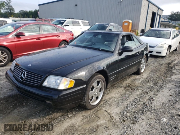 2000 Mercedes-Benz SL-Class with VIN WDBFA68F0YF190618, listed as a Copart auction lot 64791414 with 24,489 mi miles and Salvage Title. Bid and sale history available at carsss.com. Image 1.