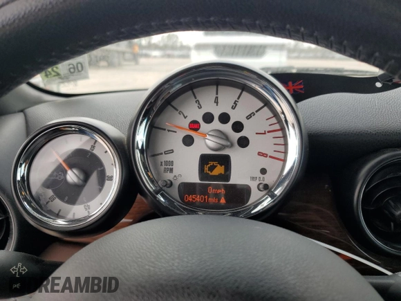 2011 MINI Convertible S with VIN WMWZP3C58BTX83725, listed as a Copart auction lot 44418965 with 45,401 mi miles and Salvage title. Bid and sale history available at DreamBid. Image 9.