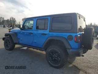 2022 Jeep Wrangler Unlimited Willys with VIN 1C4HJXDM0NW152614, listed as a Copart auction lot 83208664 with 51,913 mi miles and Salvage Title. Bid and sale history available at DreamBid. Image 2.
