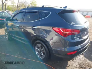 2016 Hyundai Santa Fe z VIN 5XYZUDLB3GG312687, wystawiony jako IAAI lot #42096854 z przebiegiem 162 586 mil mil oraz . Historia ofert i sprzedaży dostępna na DreamBid. Obrazek 3.