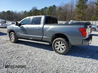 2016 Nissan Titan XD Platinum Reserve with VIN 1N6BA1F23GN509675, listed as a Copart auction lot 88759295 with 52,459 mi miles and Salvage Title. Bid and sale history available at carsss.com. Image 2.