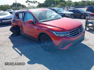 2024 Volkswagen Tiguan SE with VIN 3VVNB7AX5RM061571, listed as a IAAI auction lot 41837016 with 4,969 mi miles and . Bid and sale history available at DreamBid. Image 1.