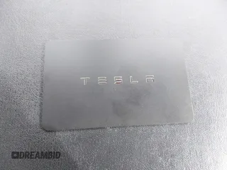 2020 Tesla Model 3 Long Range z VIN 5YJ3E1EB0LF600098, wystawiony jako IAAI lot #41071258 z przebiegiem 149 939 mil mil oraz . Historia ofert i sprzedaży dostępna na DreamBid. Obrazek 11.