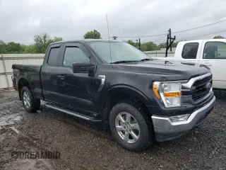 2021 Ford F-150 XL with VIN 1FTEX1EP9MKD20845, listed as a Copart auction lot 57053855 with 27,824 mi miles and Salvage title. Bid and sale history available at DreamBid. Image 4.