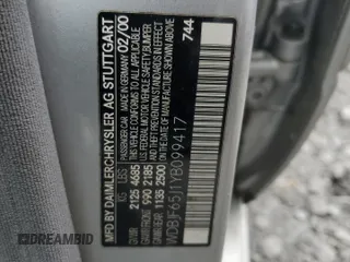 2000 Mercedes-Benz E 320 with VIN WDBJF65J1YB099417, listed as a Copart auction lot 54656915 with 130,387 mi miles and Salvage Title. Bid and sale history available at DreamBid. Image 12.