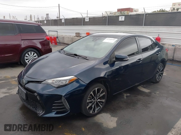 2019 Toyota Corolla L with VIN 5YFBURHE5KP890375, listed as a IAAI auction lot 42160343 with 87,654 mi miles and . Bid and sale history available at DreamBid. Image 2.