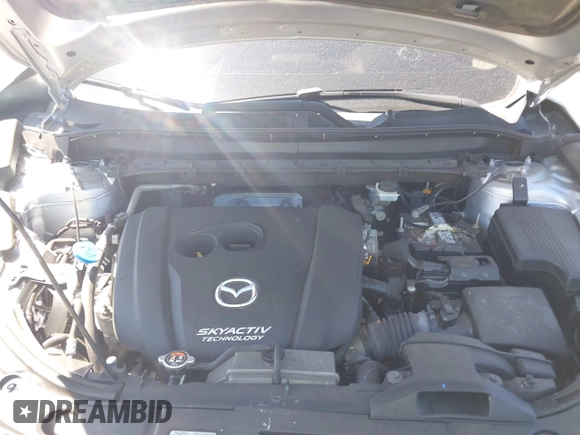 2019 Mazda CX-5 Grand Touring with VIN JM3KFADM1K1606082, listed as a IAAI auction lot 41875878 with 66,089 mi miles. Bid and sale history available at carsss.com. Image 10.