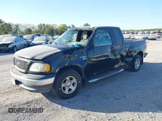 2003 Ford F-150 XL with VIN 1FTRX07W63KD30974, listed as a IAAI auction lot 40609687 with 208,378 mi miles and . Bid and sale history available at DreamBid. Image 2.