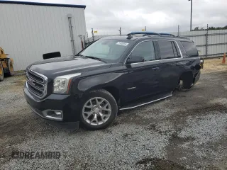 2018 GMC Yukon SLT with VIN 1GKS1BKC2JR314890, listed as a Copart auction lot 71433654 with 95,863 mi miles and Salvage Title. Bid and sale history available at carsss.com. Image 1.