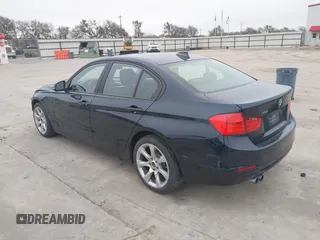 2015 BMW 3 Series 328i xDrive with VIN WBA3B3C54FJ984107, listed as a IAAI auction lot 41565829 with 98,557 mi miles and . Bid and sale history available at DreamBid. Image 3.
