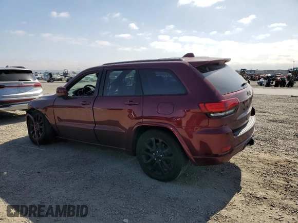 2020 Jeep Grand Cherokee Laredo E with VIN 1C4RJEAG2LC379633, listed as a Copart auction lot 58437555 with 57,219 mi miles and Salvage title. Bid and sale history available at DreamBid. Image 2.