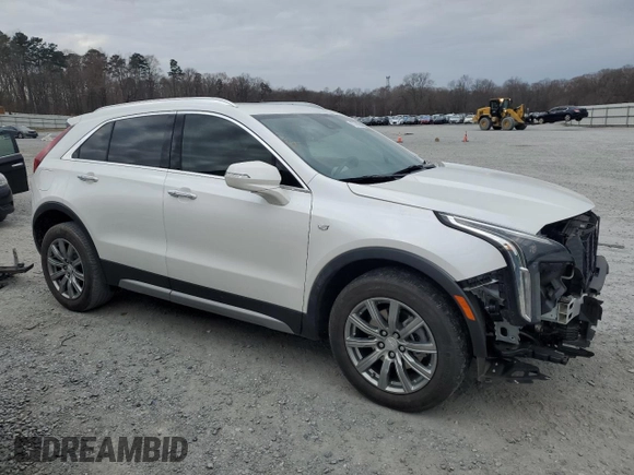 2021 Cadillac XT4 FWD Premium Luxury with VIN 1GYFZCR43MF032297, listed as a Copart auction lot 47379085 with 36,065 mi miles and Salvage Title. Bid and sale history available at DreamBid. Image 4.