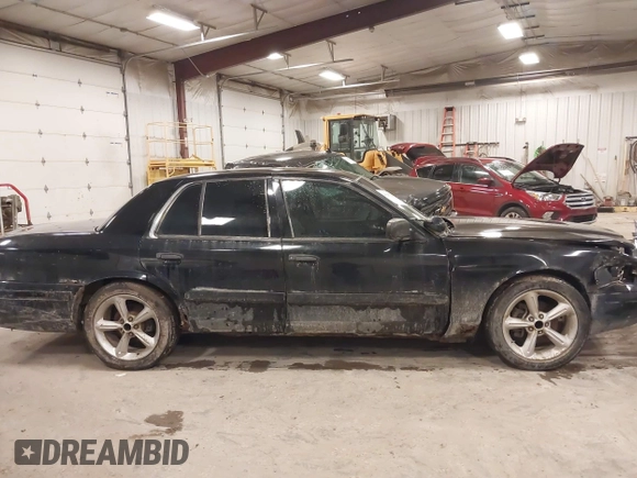 2006 Ford Police Interceptor with VIN 2FAFP71W06X154483, listed as a IAAI auction lot 41207706 with 139,484 mi miles and . Bid and sale history available at DreamBid. Image 14.