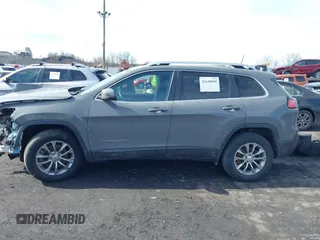 2021 Jeep Cherokee Altitude with VIN 1C4PJMLB4MD166407, listed as a IAAI auction lot 41648968 with 59,680 mi miles. Bid and sale history available at carsss.com. Image 14.