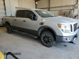 2016 Nissan Titan XD PRO-4X with VIN 1N6BA1F44GN505507, listed as a Copart auction lot 71030524 with 133,490 mi miles and Clean Title. Bid and sale history available at carsss.com. Image 4.