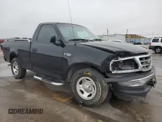 2000 Ford F-150 XL with VIN 3FTZF1728YMA63732, listed as a Copart auction lot 80010344 with Not provided miles and Salvage title. Bid and sale history available at DreamBid. Image 4.