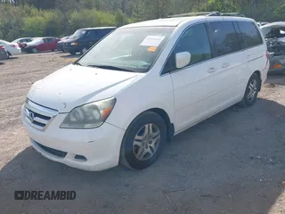 2006 Honda Odyssey EX-L z VIN 5FNRL387X6B452405, wystawiony jako IAAI lot #41884680 z przebiegiem 333 366 mil mil oraz . Historia ofert i sprzedaży dostępna na DreamBid. Obrazek 2.
