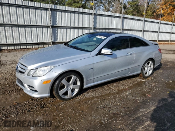 2012 Mercedes-Benz E 550 with VIN WDDKJ7DB2CF151973, listed as a Copart auction lot 82667474 with 130,590 mi miles and Salvage Title. Bid and sale history available at DreamBid. Image 1.