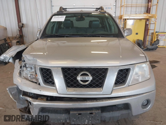 2010 Nissan Frontier SE with VIN 1N6AD0FV5AC439977, listed as a IAAI auction lot 41666404 with 152,004 mi miles and . Bid and sale history available at DreamBid. Image 12.