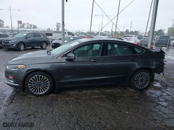 2017 Ford Fusion Energi Titanium with VIN 3FA6P0SU8HR329570, listed as a IAAI auction lot 41773023 with 112,022 mi miles. Bid and sale history available at carsss.com. Image 15.