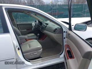 2005 Toyota Camry LE with VIN JTDBF30KX50165586, listed as a IAAI auction lot 41948322 with 84,326 mi miles and . Bid and sale history available at DreamBid. Image 5.