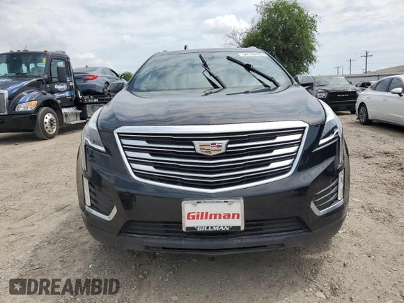 2019 Cadillac XT5 Premium Luxury FWD with VIN 1GYKNERS2KZ235309, listed as a Copart auction lot 54136495 with 133,964 mi miles and Salvage title. Bid and sale history available at DreamBid. Image 5.