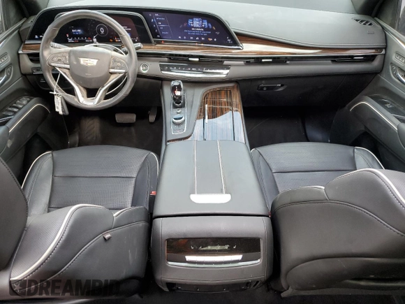 2023 Cadillac Escalade 4WD Premium Luxury with VIN 1GYS4BKL5PR388049, listed as a Copart auction lot 54626395 with 28,152 mi miles and Salvage title. Bid and sale history available at DreamBid. Image 8.
