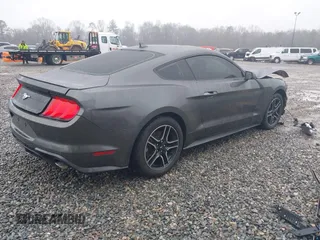 2020 Ford Mustang EcoBoost with VIN 1FA6P8TH6L5147913, listed as a IAAI auction lot 41427938 with 83,155 mi miles. Bid and sale history available at carsss.com. Image 4.
