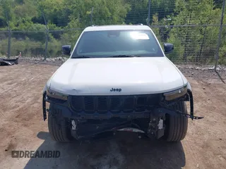 2023 Jeep Grand Cherokee Altitude with VIN 1C4RJHAG4P8106056, listed as a IAAI auction lot 42275021 with 27,251 mi miles and . Bid and sale history available at DreamBid. Image 12.