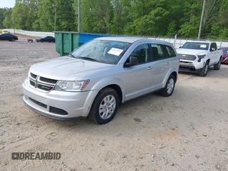 2014 Dodge Journey SE with VIN 3C4PDCAB0ET139916, listed as a IAAI auction lot 42072199 with 92,591 mi miles and . Bid and sale history available at DreamBid. Image 2.