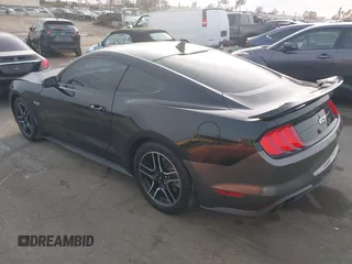 2021 Ford Mustang GT with VIN 1FA6P8CF2M5124404, listed as a IAAI auction lot 41072026 with 48,310 mi miles. Bid and sale history available at carsss.com. Image 3.