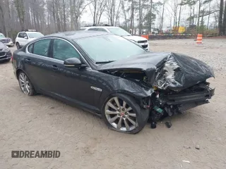 2014 Jaguar XF V6 SC with VIN SAJWJ0EF9E8U12853, listed as a IAAI auction lot 41780409 with 138,329 mi miles. Bid and sale history available at carsss.com. Image 1.