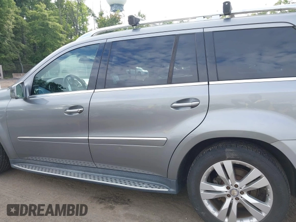 2012 Mercedes-Benz GL 450 z VIN 4JGBF7BEXCA766840, wystawiony jako IAAI lot #42521600 z przebiegiem 154 811 mil mil oraz . Historia ofert i sprzedaży dostępna na DreamBid. Obrazek 14.
