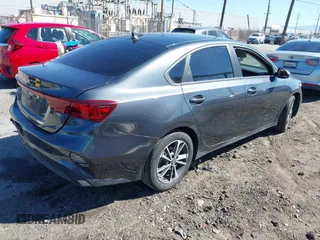 2023 Kia Forte LXS with VIN 3KPF24AD6PE648764, listed as a IAAI auction lot 41866394 with 26,341 mi miles and . Bid and sale history available at DreamBid. Image 4.