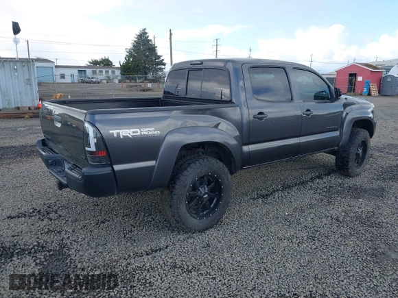 2013 Toyota Tacoma with VIN 3TMLU4ENXDM105967, listed as a IAAI auction lot 41819211 with 121,012 mi miles and . Bid and sale history available at DreamBid. Image 4.