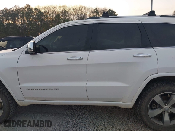 2015 Jeep Grand Cherokee High Altitude with VIN 1C4RJECG8FC175565, listed as a IAAI auction lot 41733248 with 107,947 mi miles. Bid and sale history available at carsss.com. Image 15.