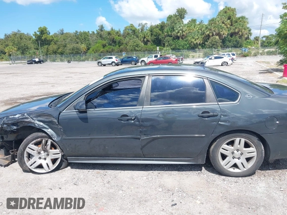 2014 Chevrolet Impala LT with VIN 2G1WB5E31E1146318, listed as a IAAI auction lot 40413281 with 422,345 mi miles and . Bid and sale history available at DreamBid. Image 14.