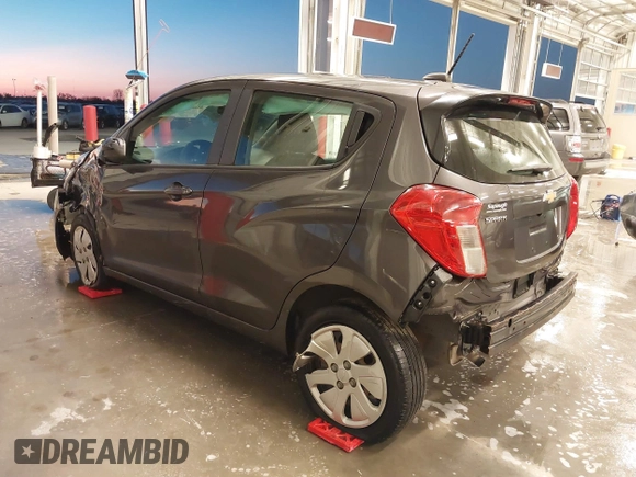 2016 Chevrolet Spark LS with VIN KL8CB6SA1GC570011, listed as a IAAI auction lot 40806037 with 106,786 mi miles. Bid and sale history available at carsss.com. Image 3.