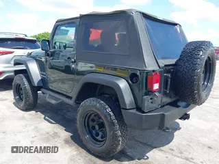 2010 Jeep Wrangler Sport with VIN 1J4AA2D17AL126737, listed as a IAAI auction lot 42237596 with 119,391 mi miles and . Bid and sale history available at carsss.com. Image 3.