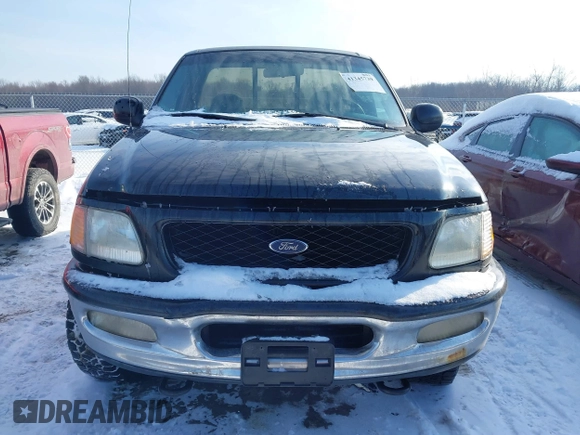 1997 Ford F-150 XL with VIN 1FTDF08W5VKD47103, listed as a IAAI auction lot 41345739 with 209,732 mi miles. Bid and sale history available at carsss.com. Image 12.