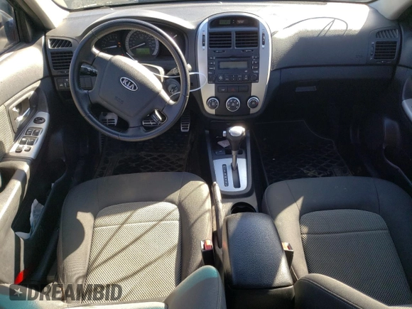 2009 Kia Spectra EX with VIN KNAFE221395026165, listed as a Copart auction lot 73715994 with 245,813 mi miles and Salvage Title. Bid and sale history available at carsss.com. Image 8.