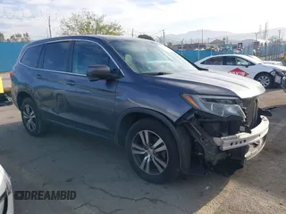 2016 Honda Pilot EX with VIN 5FNYF5H33GB015231, listed as a IAAI auction lot 41809357 with 145,970 mi miles. Bid and sale history available at carsss.com. Image 1.