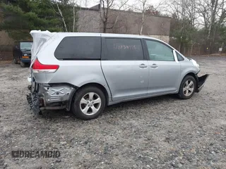 2012 Toyota Sienna with VIN 5TDKA3DC7CS015592, listed as a IAAI auction lot 40839775 with 161,944 mi miles and . Bid and sale history available at DreamBid. Image 4.