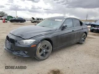 2013 BMW 3 Series 328i with VIN WBA3C1G59DNR45630, listed as a Copart auction lot 52037215 with 105,053 mi miles and Salvage Title. Bid and sale history available at carsss.com. Image 1.
